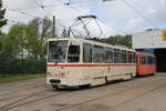 rostock/557119/tatra-t6a2704mit-lowa-wagen-554-vor-dem Tatra T6A2(704)mit Lowa-Wagen 554 vor dem Depot 12 in Rostock-Marienehe.20.05.2017