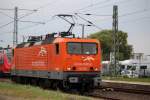 143 001-6 beim Rangieren im Bahnhof Warnemnde Sie fuhr spter Richtung Rostock-Bramow zur Abestellung.Aufgenommen am 09.08.2014 