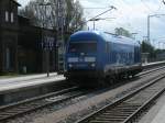 Zum Tanken war 253 015-8,am 11.Mai 2012,Lz nach Putbus an die dortige Tankstelle gefahren.Hier erwischte ich die Lok bei der Rckkehr von Putbus in Bergen/Rgen.