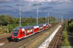 IRE-Garnitur  Magdeburg-Berlin-Express  im Feiertagsdienst als RE20 (RE 17712) von Halle(Saale)Hbf nach Uelzen in Stendal Ortsteil Wahrburg und geschoben hatte die 112 139-1  Otto hat Zugkraft .