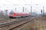 RE13 (RE 17688) von Leipzig Hbf nach Magdeburg Hbf in Magdeburg-Neustadt und geschoben hatte die 112 169-8. 16.01.2016