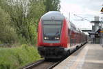 DABpbzfa 764.0 als RE 18490 von Berlin Hbf(tief)nach Warnemünde bei der Durchfahrt in Rostock-Marienehe.20.05.2017