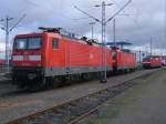 Rostock Hbf 112 114,143 250 und 120 202,am 17.Dezember 2011,im Bh Rostock.