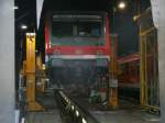 Rostock Hbf Dank ge�ffneter Tore im Triebwagenschuppen konnte ich den aufgebockten 628 314 im Bh Rostock,am 17.Dezember 2011,fotografieren.