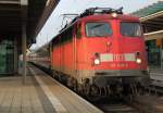 Rostock-Spezial 110 438-9 mit IC 2409 von Rostock Hbf nach K�ln Hbf kurz vor der Ausfahrt im Rostocker Hbf.11.12.2011