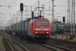 Rostock-Spezial Treffen im Rostocker Seehafen link´s S3 nach Rostock-Seehafen/Nord in der goldenen Mitte 152 006-3 mit LKW-Walter nach Hamburg und recht´s stehen RBH 103(143 041-2)+RBH 110(143 084-2)Rostock-Dierkow.12.12.2011