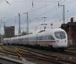 Rostock-Spezial 411 019-3 als ICE 1611 von Warnem�nde nach M�nchen Hbf bei der Abfahrt im Rostocker Hbf.17.12.2011 