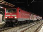 Rostock-Spezial 143 303-6 mit S1 von Rostock Hbf nach Warnem�nde kurz nach der Abfahrt im Rostocker Hbf.28.12.2011