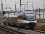 OLA VT 0010/643 117-4 auf dem Weg von Rostock Hbf ...