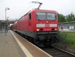 S-Bahn Rostock 143 841-5 mit S1 von Rostock Hbf Richtung Warnem�nde bei der Ausfahrt im Hp Rostock-L�tten Klein.(18.05.10)