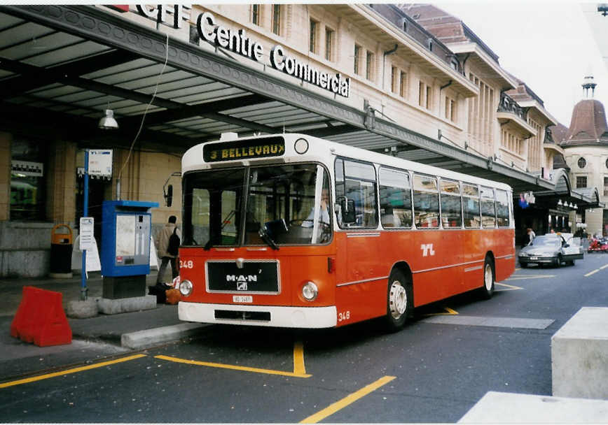 (030'311) - TL Lausanne - Nr. 348/VD 1487 - MAN am 21. M�rz 1999 beim Bahnhof Lausanne