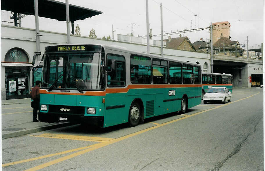 (030'616) - GFM Fribourg - Nr. 7/FR 443 - NAW/Hess am 3. April 1999 beim Bahnhof Fribourg