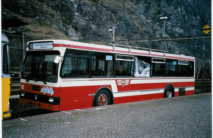 (051'313) - VB Biel (RWB) - Nr. 112 - FBW/R&J am 1. Januar 2002 beim Bahnhof Biasca