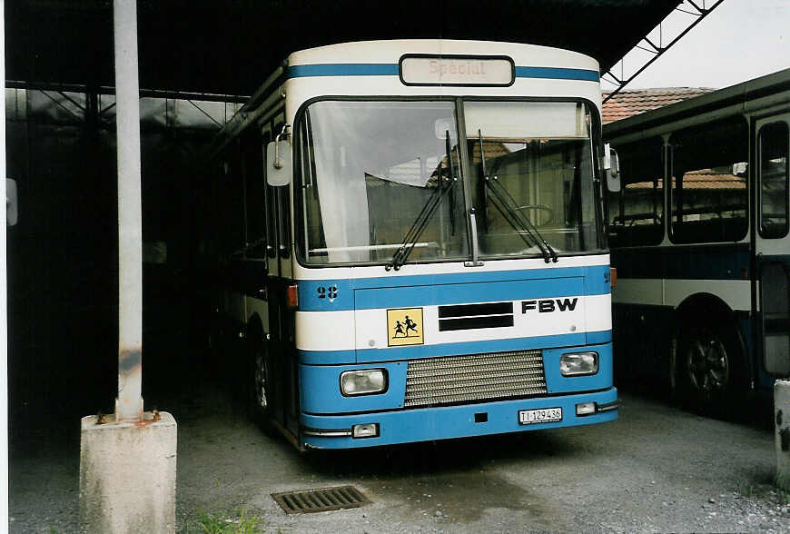 (054'802) - AMSA Chiasso - Nr. 28/TI 129'436 - FBW/Lauber (ex VMCV Clarens Nr. 24) am 23. Juli 2002 in Chiasso, Garage