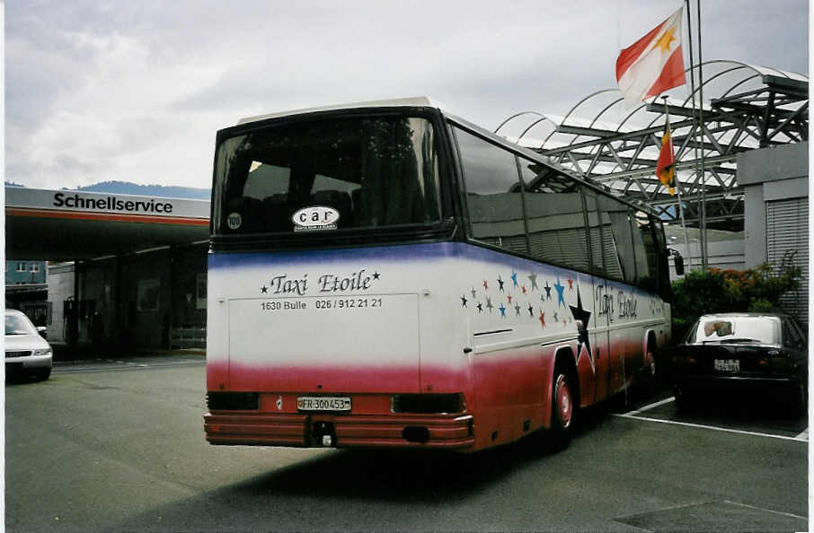 (055'932) - Taxi Etoile, Bulle - FR 300'453 - Dr�gm�ller am 8. September 2002 in Tun, Stadiongarage