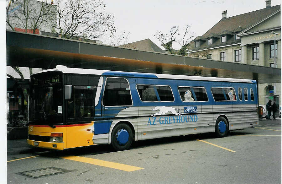 (057'816) - PTT-Regie - P 25'665 - Setra am 27. Dezember 2002 beim Bahnhof Aarau