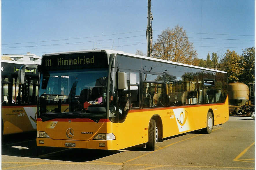 (072'319) - PostAuto Nordwestschweiz - BL 170'214 - Mercedes (ex P 25'249) am 24. Oktober 2004 beim Bahnhof Laufen