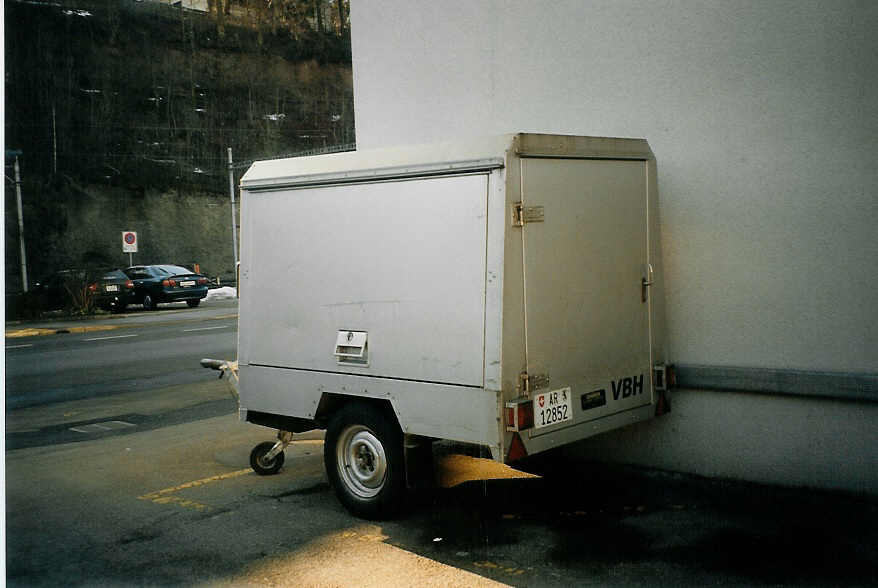 (073'822) - VBH Herisau - AR 12'852 - Zbinden Gep�ckanh�nger am 8. Januar 2005 beim Bahnhof Herisau