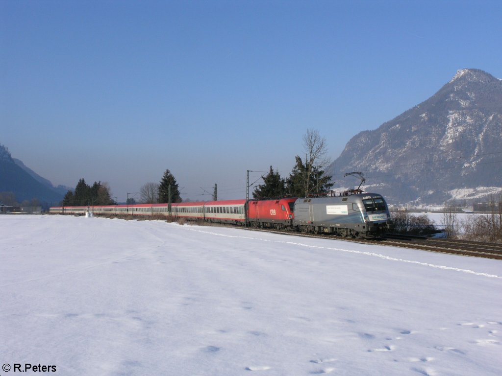 1116 038+ Schwester Maschine ziehen ein EC bei Oberaudorf. 16.02.10