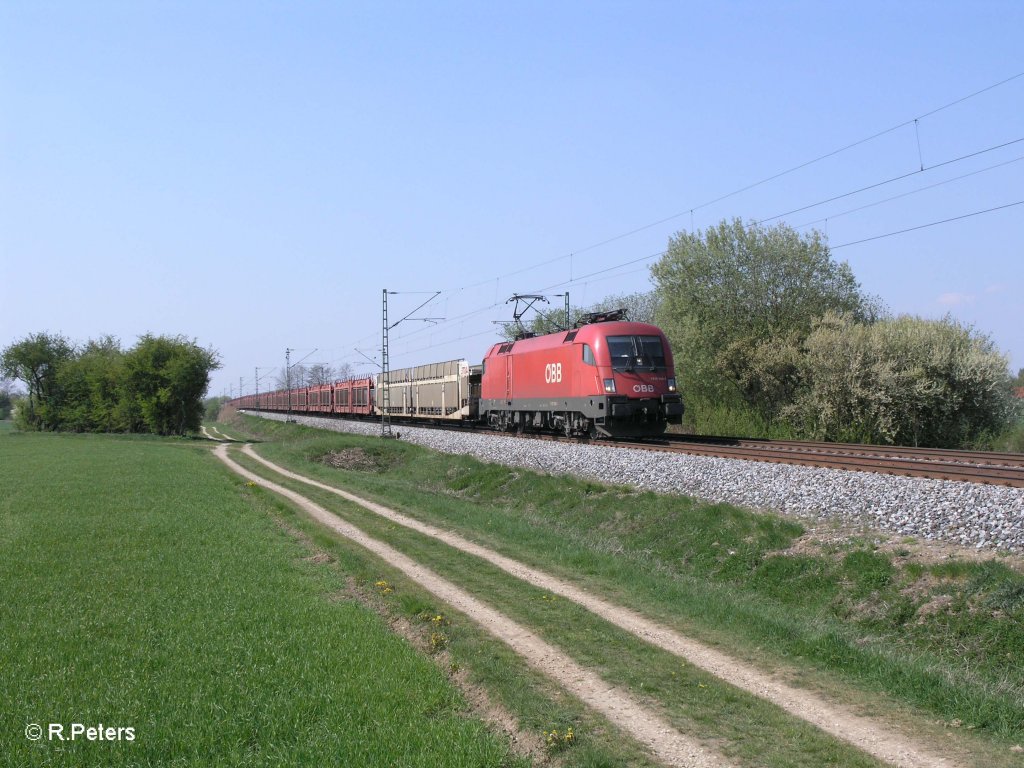 1116 184-1 mit leeren Autotransportzug bei Moosham. 21.04.11