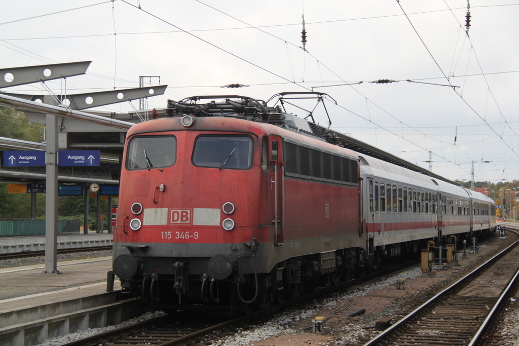 115 346-9 mit IC 2409 von Stralsund nach Kln Hbf bei der Ausfahrt im Rostocker Hbf.14.10.2012