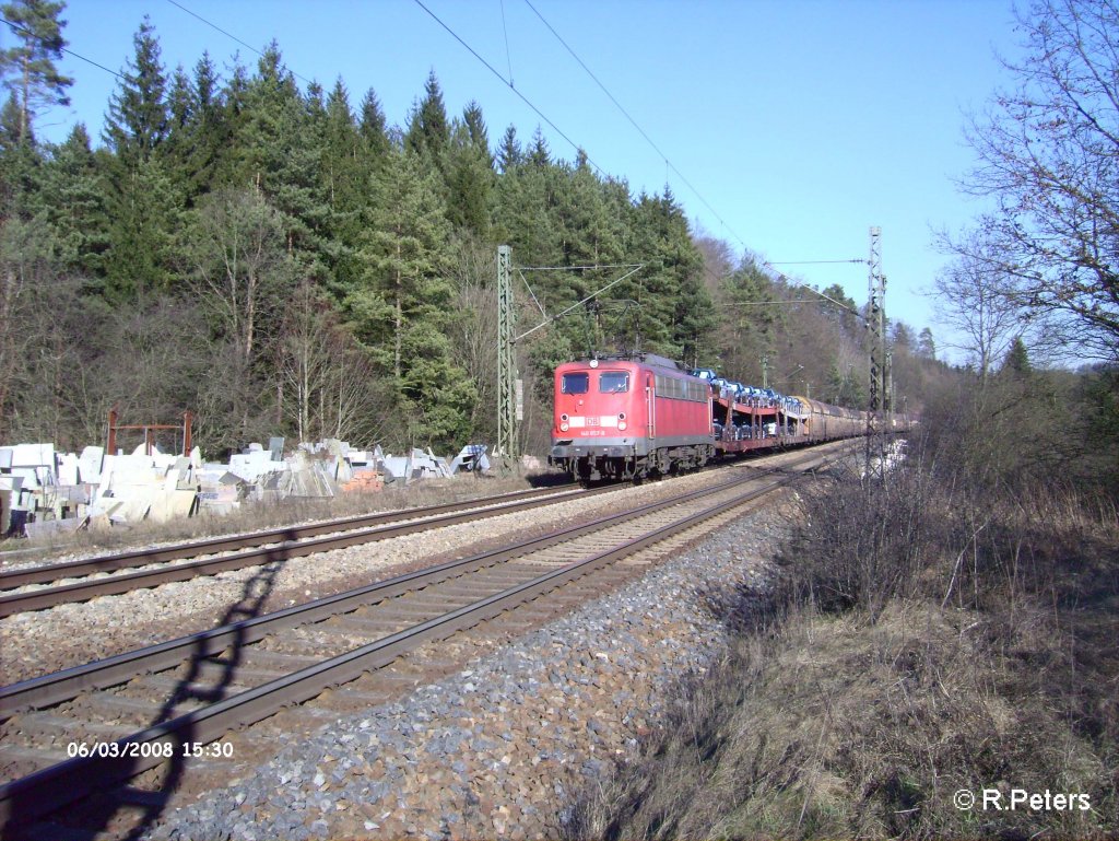 140 657-8 zieht ein BMW-Zug bei Deining. 06.03.08