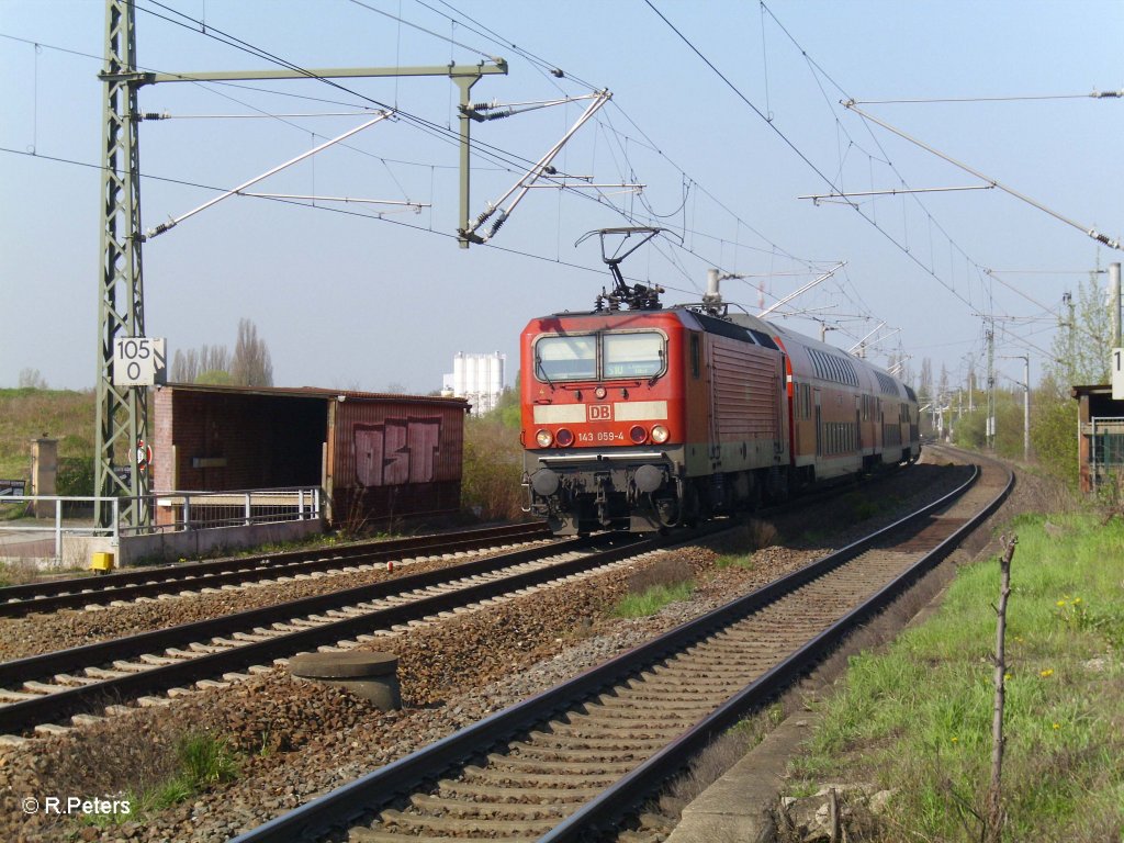 143 059-4 fuhr mit der S10 Leipzig in Schkeuditz ein. 25.04.10