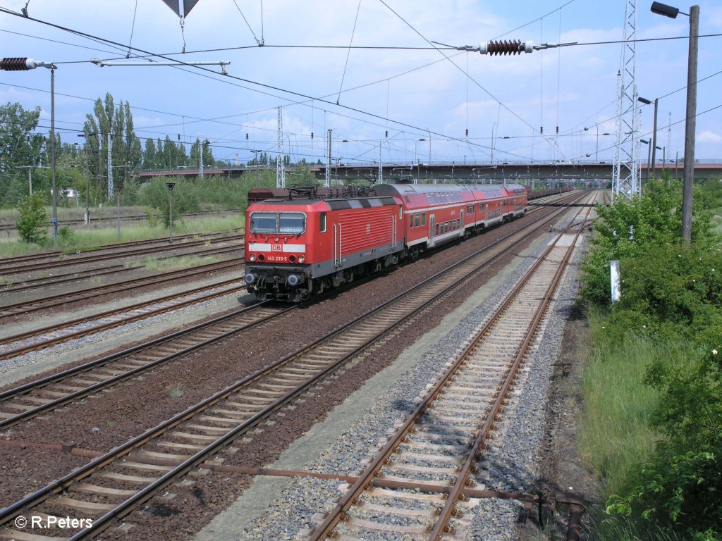 143 233-5 durchfhrt Eisenhttenstadt mit einer RB Cottbus. 19.05.09