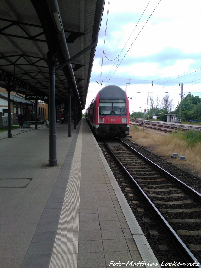 143 889-4 als S1 im Endbahnhof Warnem�nde am 22.6.13
