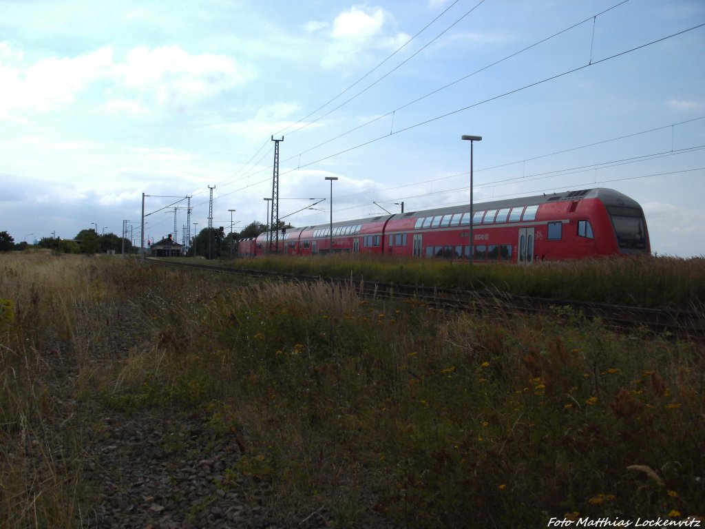 143 899-4 mit dem RE9 mit ziel Stralsund Hbf bei der Einfahrt in Altef�hr am 7.8.13