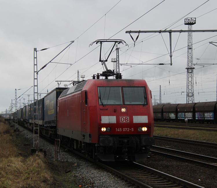 145 072-5 mit LKW-Walter von WRS(Rostock-Seehafen)nach 
AHBI(Hamburg-Billwerder)bei durchfahrt in WRD(Rostock-Dierkow)20.01.2012