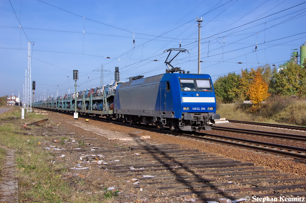 145-CL 204 (145 100-4) Alpha Trains fr Crossrail AG mit einem Fiat Autotransport in Satzkorn. Der Zug musste in Satzkorn zwei Gterzge und den RE1 berholen lassen und setzte danach die Fahrt in Richtung Golm weiter fort. 20.10.2012