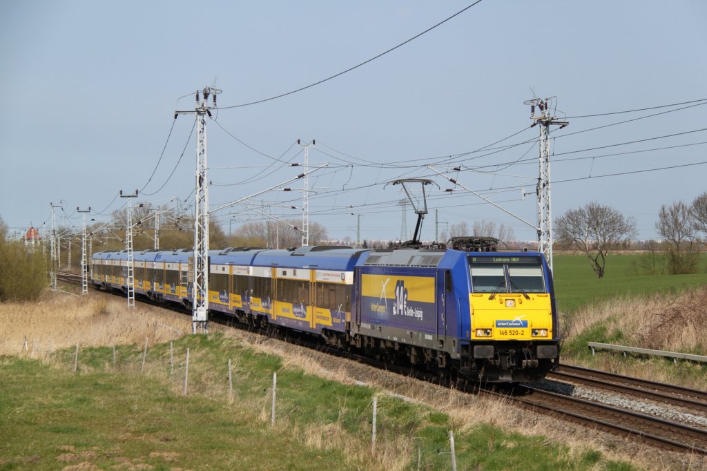 146 520-2 mit InterConnex 68904 von Warnemnde nach Leipzig Hbf bei der Durchfahrt in Sildemow.15.04.2012
