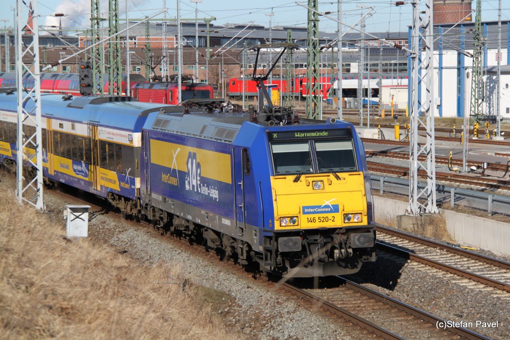 146 520-2 mit InterConnex Leipzig-Warnemnde bei der Einfahrt im Rostocker Hbf.26.02.2012