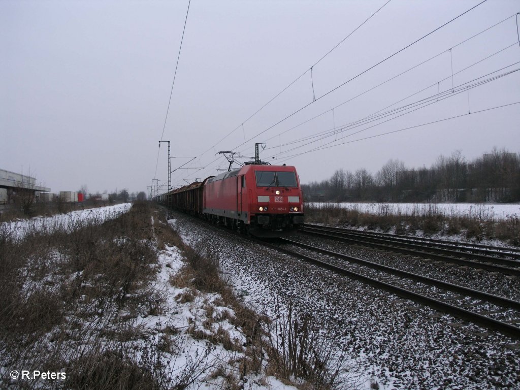 185 365-4 zieht bei Obertraubling ein gemischten Gterzug in Richtung Passau. 09.01.10