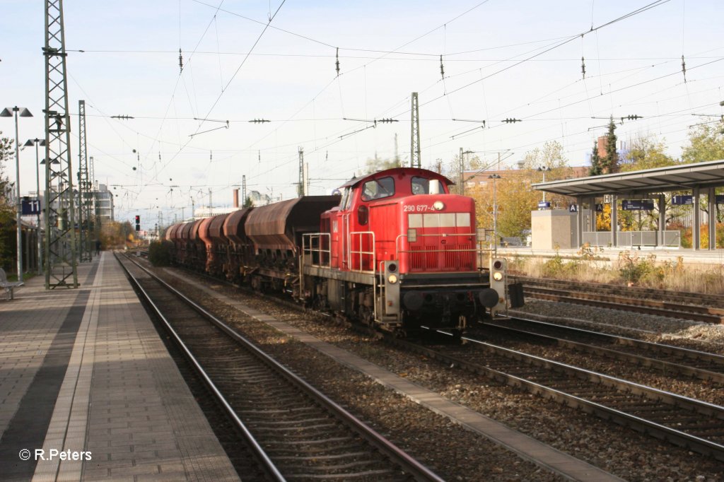 290 677-4 mit Schotterzug am Heimeranplatz in Mnchen. 04.11.10