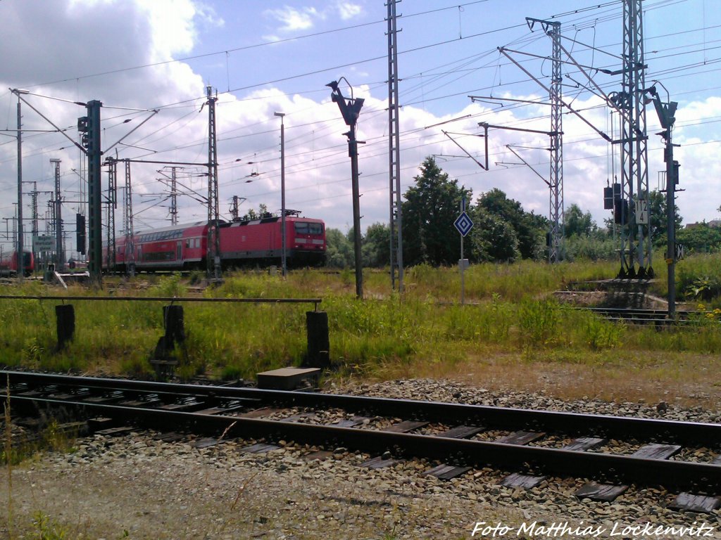 BR 143 als S3 mit ziel Rostock Hbf bei der Einfahrt in Rostock Hbf am 22.6.13