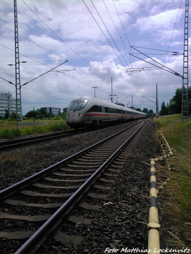 BR 411 mit dem Namen  Freie- & Hansestadt Hamburg  kurz vor dem S-Bahn Hp. Rostock-Bramow am 22.6.13