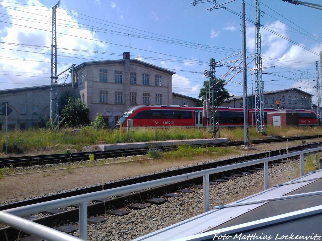 BR 642 als RE8 mit ziel Wismar bei der Einfahrt in Rostock Hbf am 22.6.13