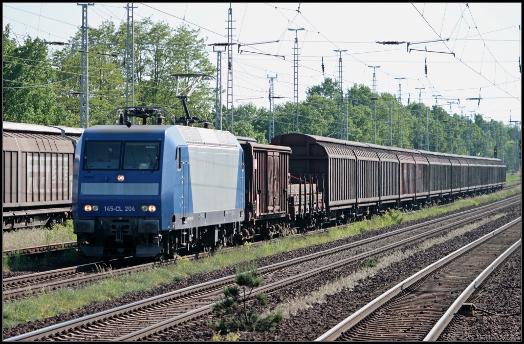 DB Schenker 145-CL 204 im Gegenlicht mit gemischten Gterzug (NVR-Nummer 9180 6145 100-4 D-ATLD, ex RBH 204, gemietet von Alpha Trains, gesehen Michendorf 03.06.2010)