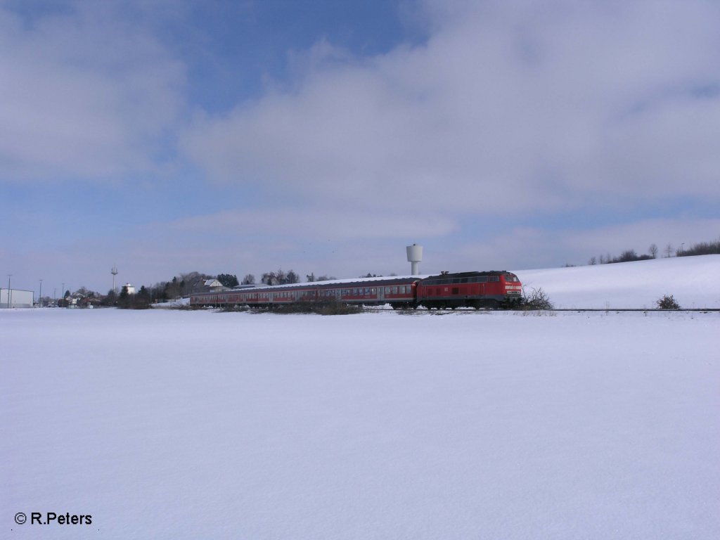 Eine 218 verlsst Buchloe mit einer RB in Richtung Kempten. 25.02.09