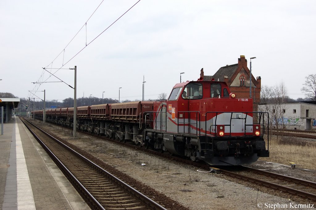 V150.05 BBL04 (214 013-5) mit Fakks Ganzzug von Wiebe in Rathenow in Richtung Stendal unterwegs. 25.03.2011