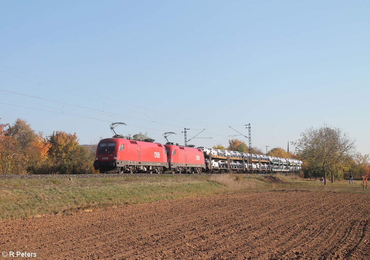 1116 056-1  Mohlibert  und 1116 083 mit Audi Autotransportzug bei Thüngersheim gen Norden. 13.10.18