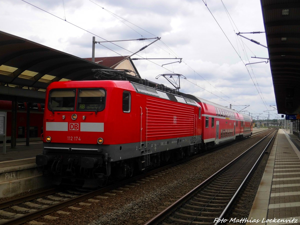 112 173 als RB mit ziel Wolfen (Bitterfeld) im Bahnhof Bitterfeld am 14.7.16