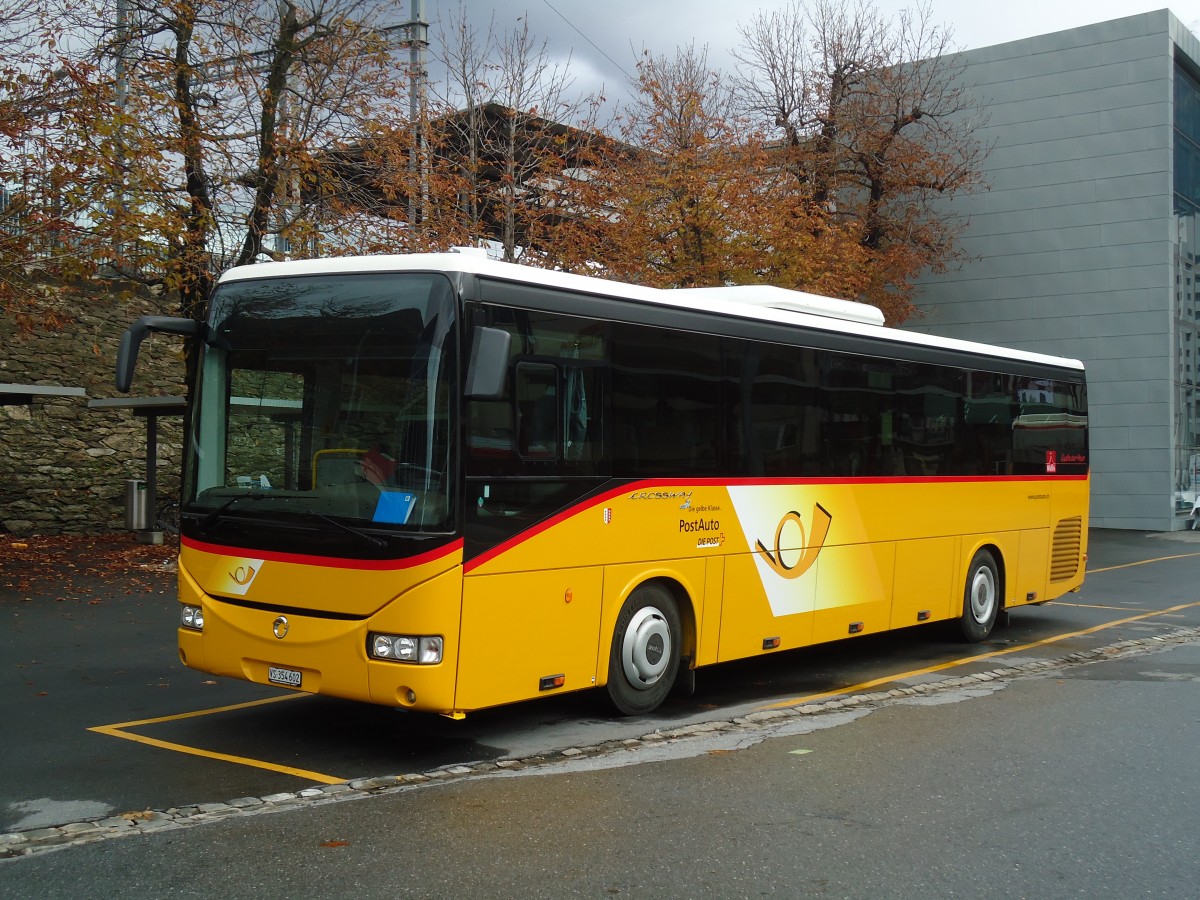 (130'844) - PostAuto Wallis - VS 354'602 - Irisbus am 1. November 2010 beim Bahnhof Brig