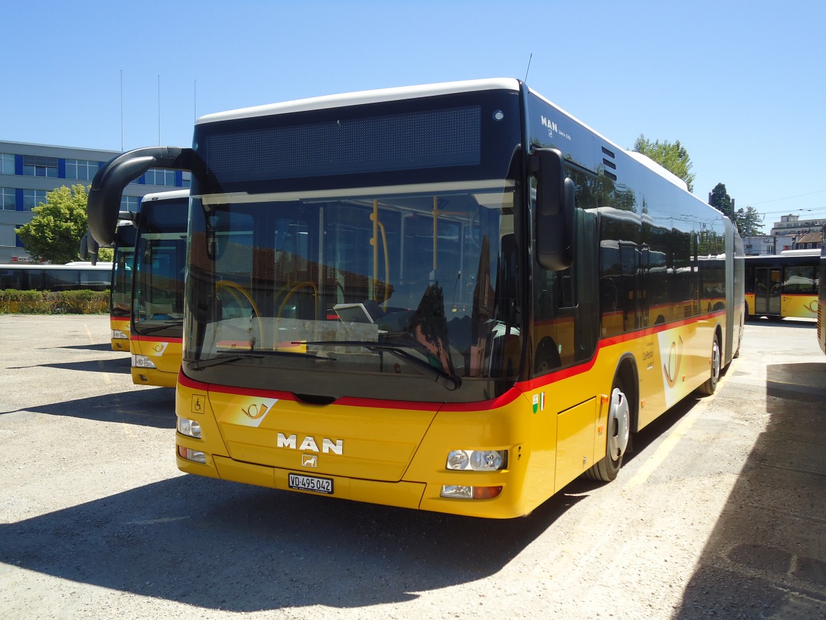 (133'904) - CarPostal Ouest - VD 495'042 - MAN am 29. Mai 2011 in Yverdon, Garage