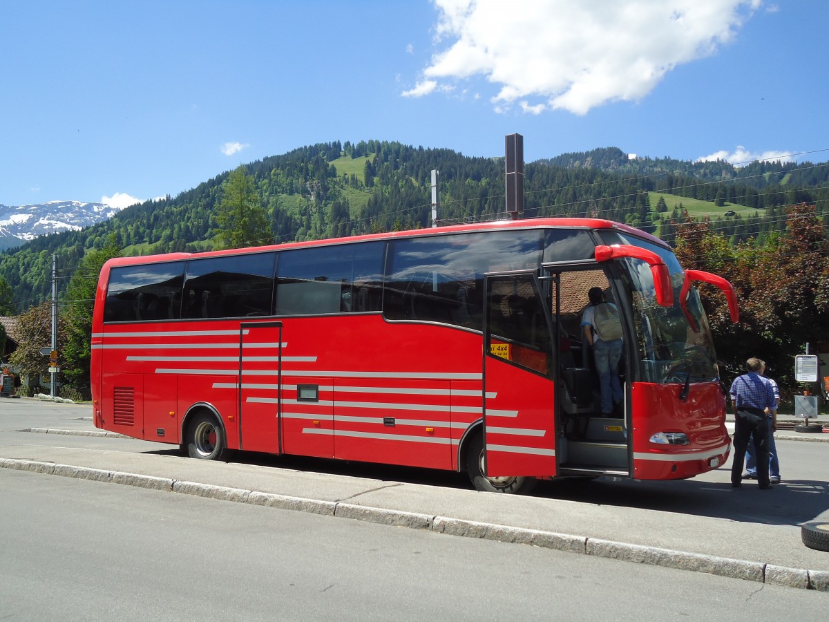 (133'921) - Ueltschi, Zweisimmen (AFA) - BE 321'159 - MAN/Atomic am 30. Mai 2011 beim Bahnhof Lenk