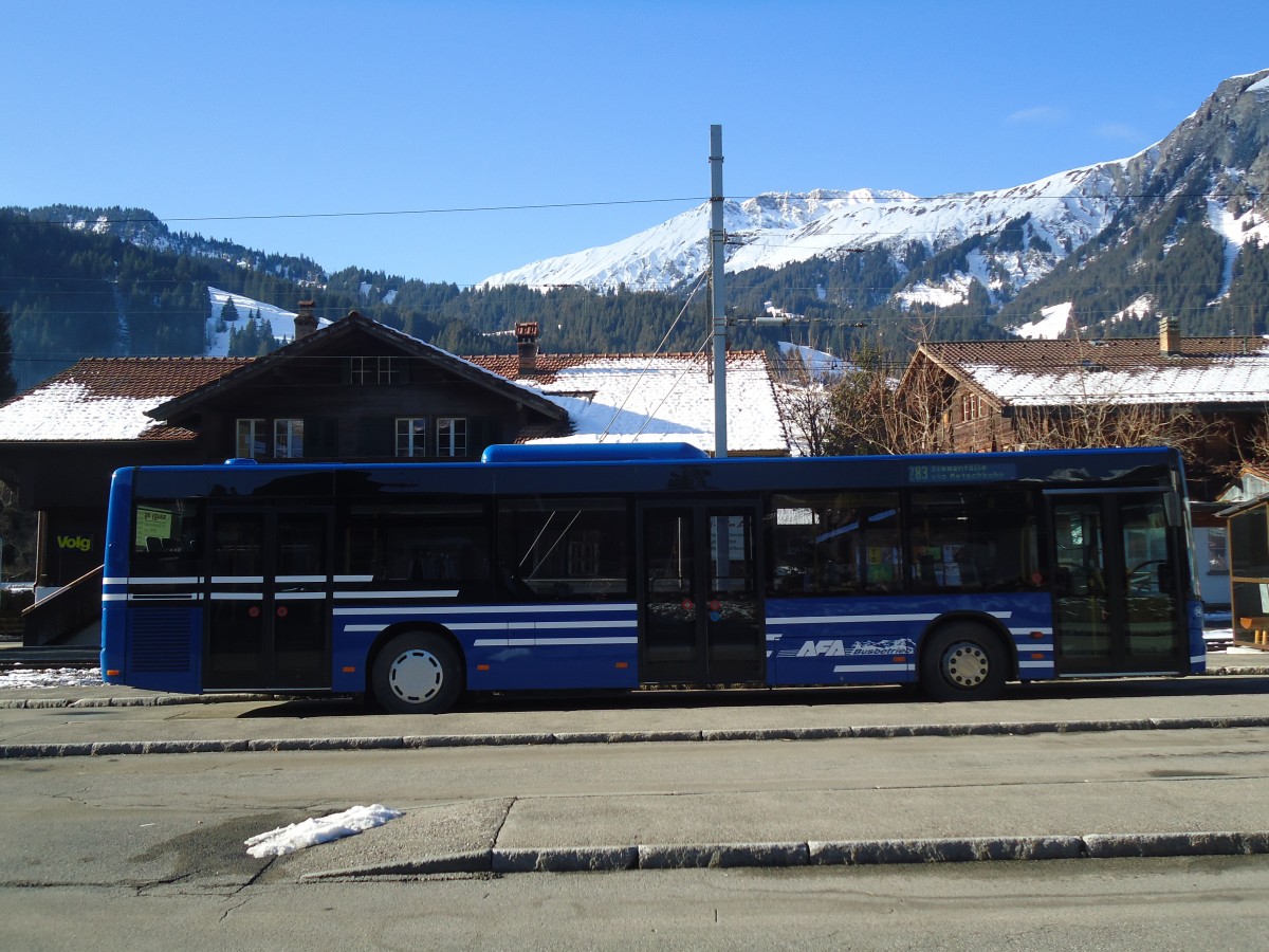 (137'141) - AFA Adelboden - Nr. 54/BE 611'056 - Neoplan (ex VBZ Z�rich Nr. 243) am 11. Dezember 2011 beim Bahnhof Lenk