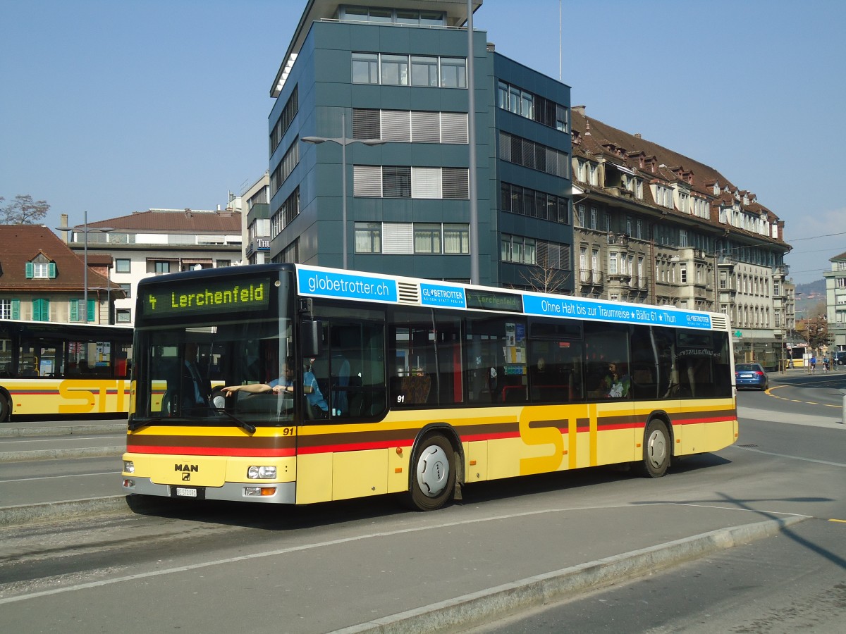 (138'400) - STI Thun - Nr. 91/BE 572'091 - MAN am 25. Mrz 2012 beim Bahnhof Thun