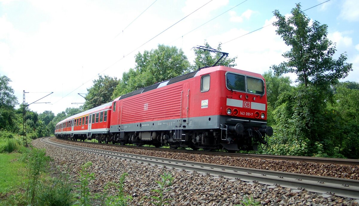 143 091-7 mit Regionalzug in Ulm am 26.06.2009.